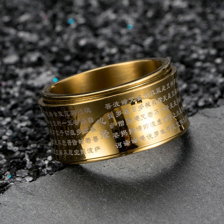 Anillo de equilibrio giratorio de acero y titanio con escrituras tibetanas en miniatura y Buddha Stones