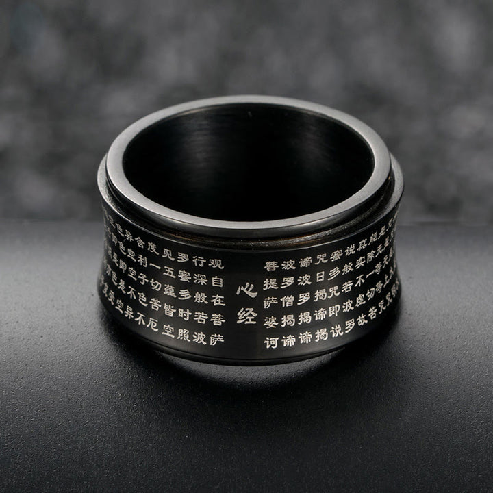 Anillo de equilibrio giratorio de acero y titanio con escrituras tibetanas en miniatura y Buddha Stones