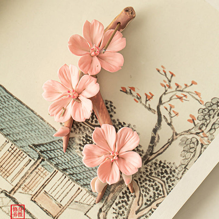 Quemador de incienso de cerámica curativo con ramas de ciruelo en flor y Buddha Stones para decoración de escritorio
