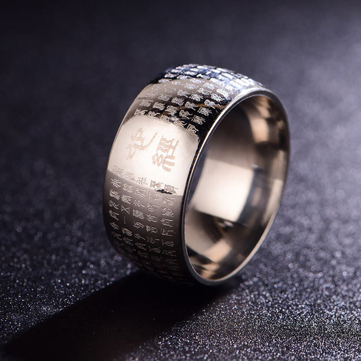 Anillo de equilibrio de acero y titanio con sello tibetano y sutra del corazón con Buddha Stones