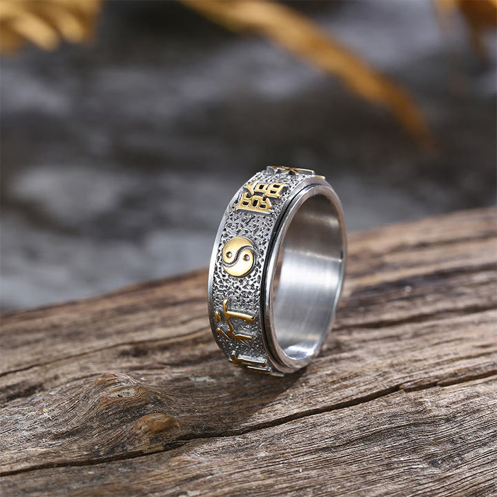 Anillo de equilibrio giratorio de acero y titanio con diseño de Yin Yang y mantra Buddha Stones de nueve palabras