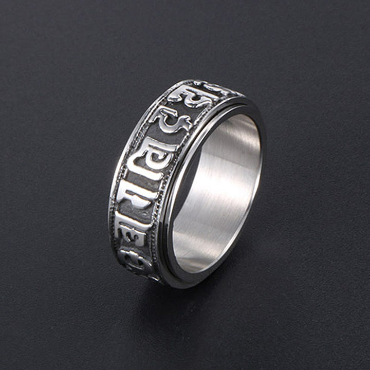 Anillo de equilibrio giratorio de acero y titanio con Buddha Stones tibetano Om Mani Padme Hum