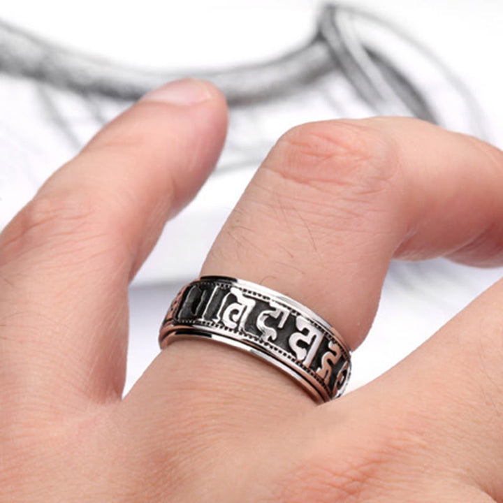 Anillo de equilibrio giratorio de acero y titanio con Buddha Stones tibetano Om Mani Padme Hum