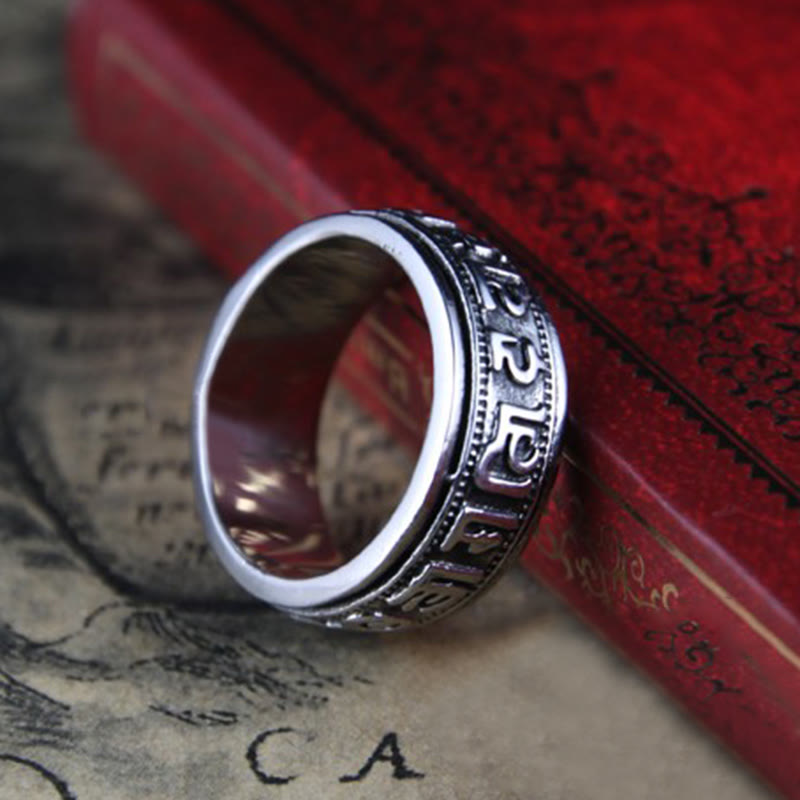 Anillo de equilibrio giratorio de acero y titanio con Buddha Stones tibetano Om Mani Padme Hum