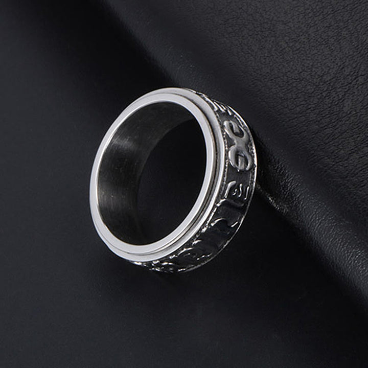 Anillo de equilibrio giratorio de acero y titanio con Buddha Stones tibetano Om Mani Padme Hum