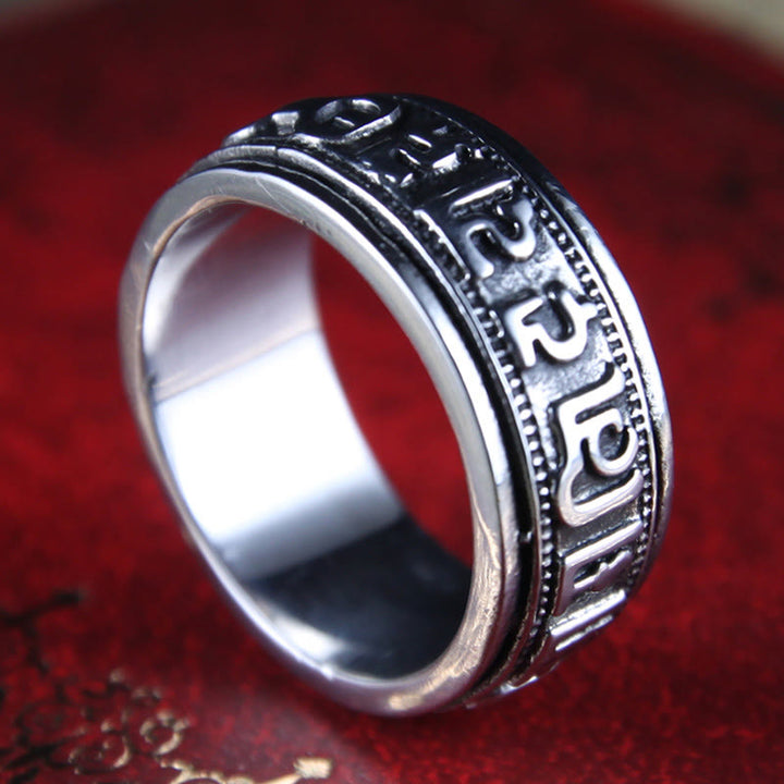 Anillo de equilibrio giratorio de acero y titanio con Buddha Stones tibetano Om Mani Padme Hum