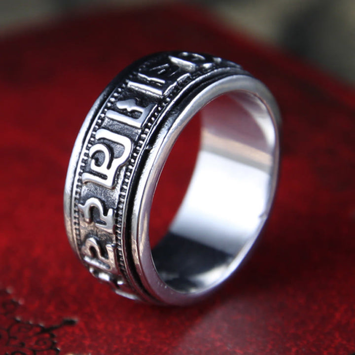 Anillo de equilibrio giratorio de acero y titanio con Buddha Stones tibetano Om Mani Padme Hum