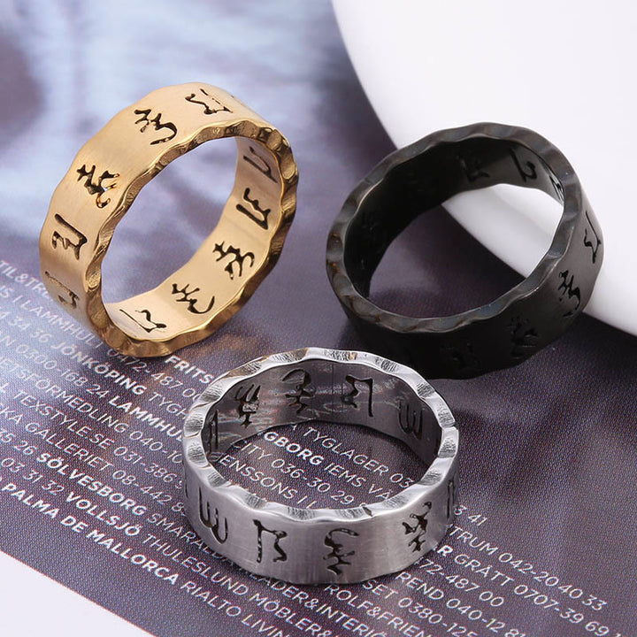 Anillo de equilibrio de acero y titanio con Om Mani Padme Hum hueco tibetano con Buddha Stones