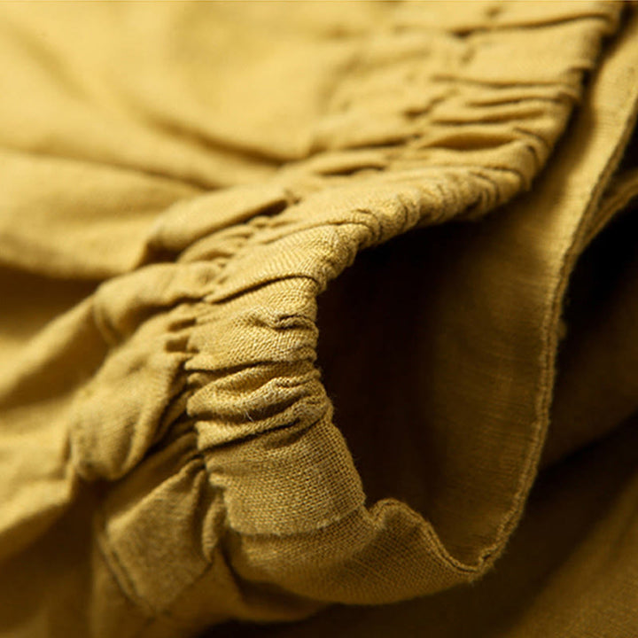 Pantalones de lino y algodón de color liso con cintura alta y pierna ancha y bolsillos con Buddha Stones