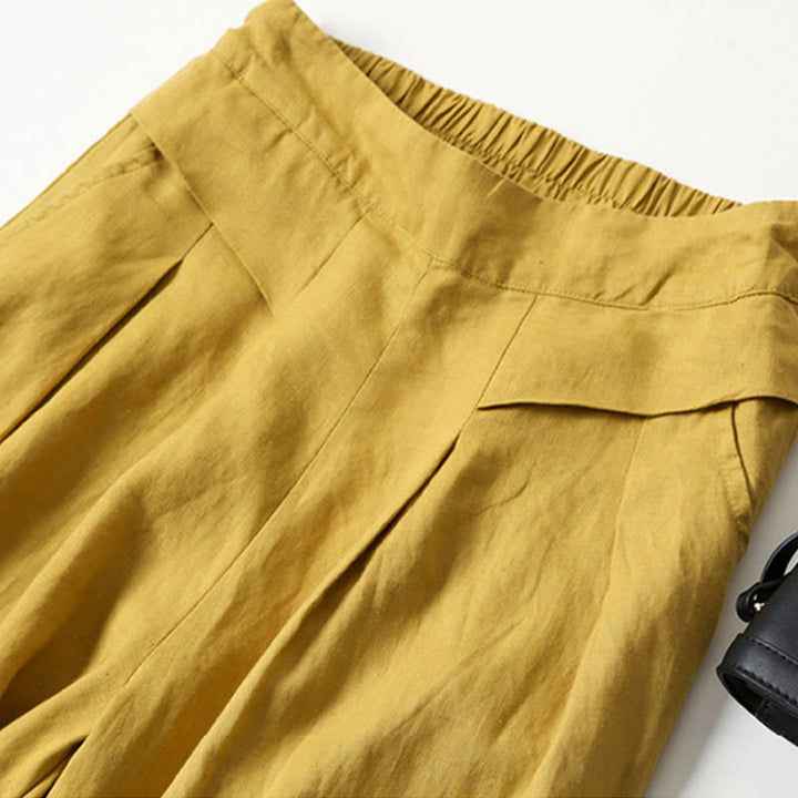 Pantalones de lino y algodón de color liso con cintura alta y pierna ancha y bolsillos con Buddha Stones