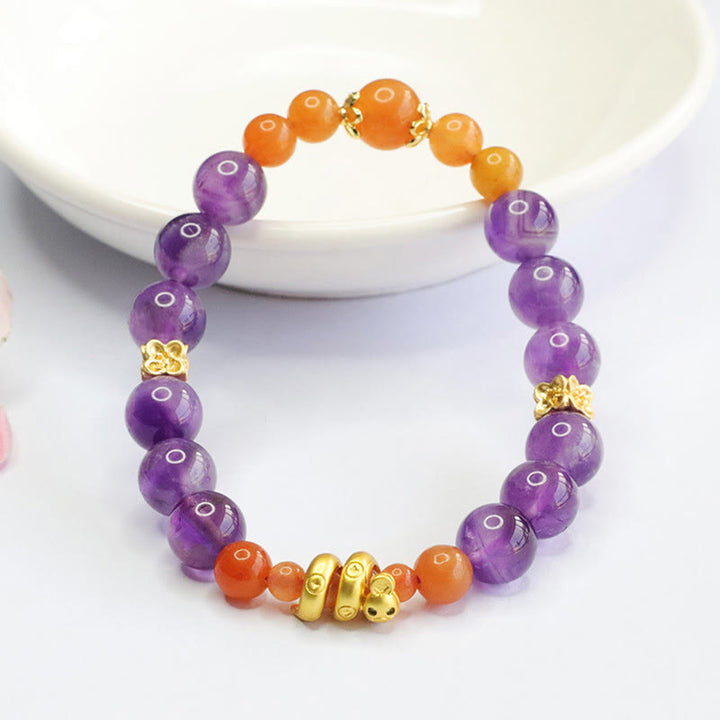 Pulsera de equilibrio del año de la serpiente con jade, seda dorada y amatista y Buddha Stones