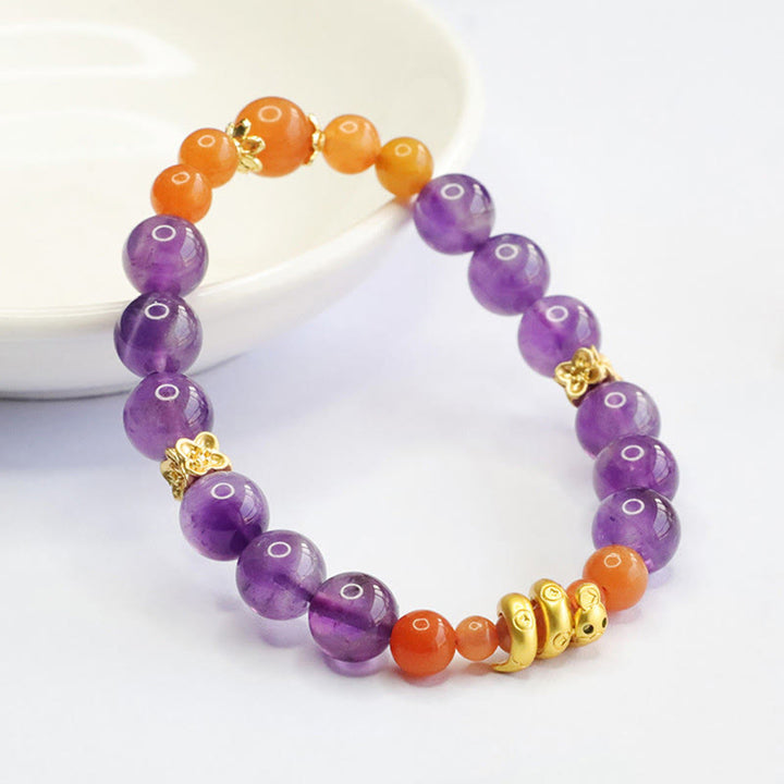 Pulsera de equilibrio del año de la serpiente con jade, seda dorada y amatista y Buddha Stones