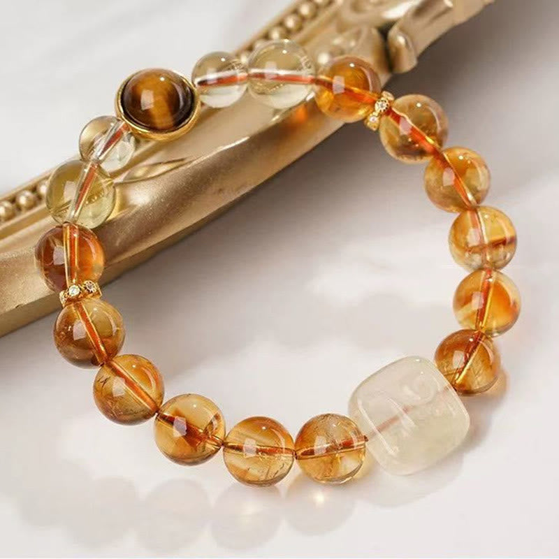 Buddha Stones Pulsera de bondad con topacio Zashi Lhamo