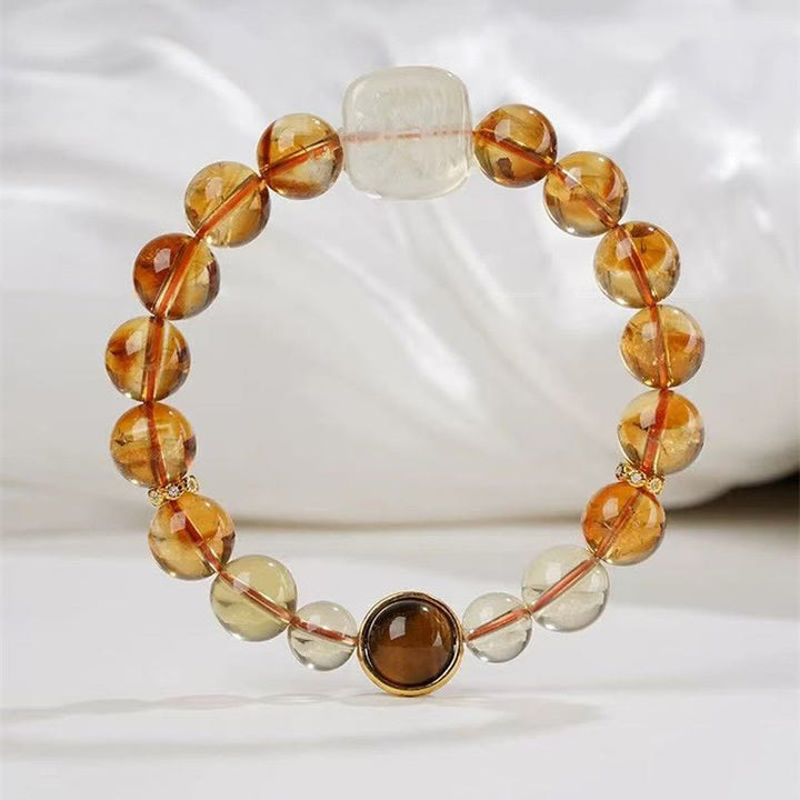 Buddha Stones Pulsera de bondad con topacio Zashi Lhamo