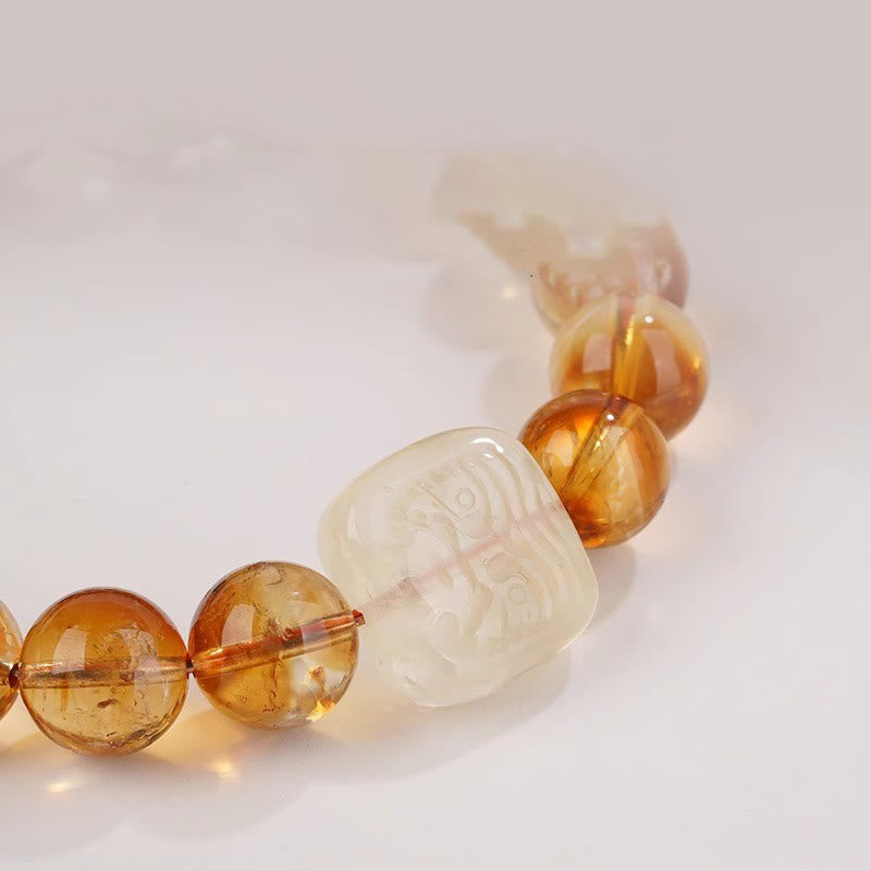 Buddha Stones Pulsera de bondad con topacio Zashi Lhamo