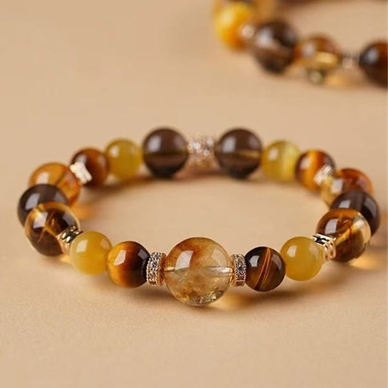 Pulsera de la felicidad con citrino, topacio y ojo de tigre de Buddha Stones
