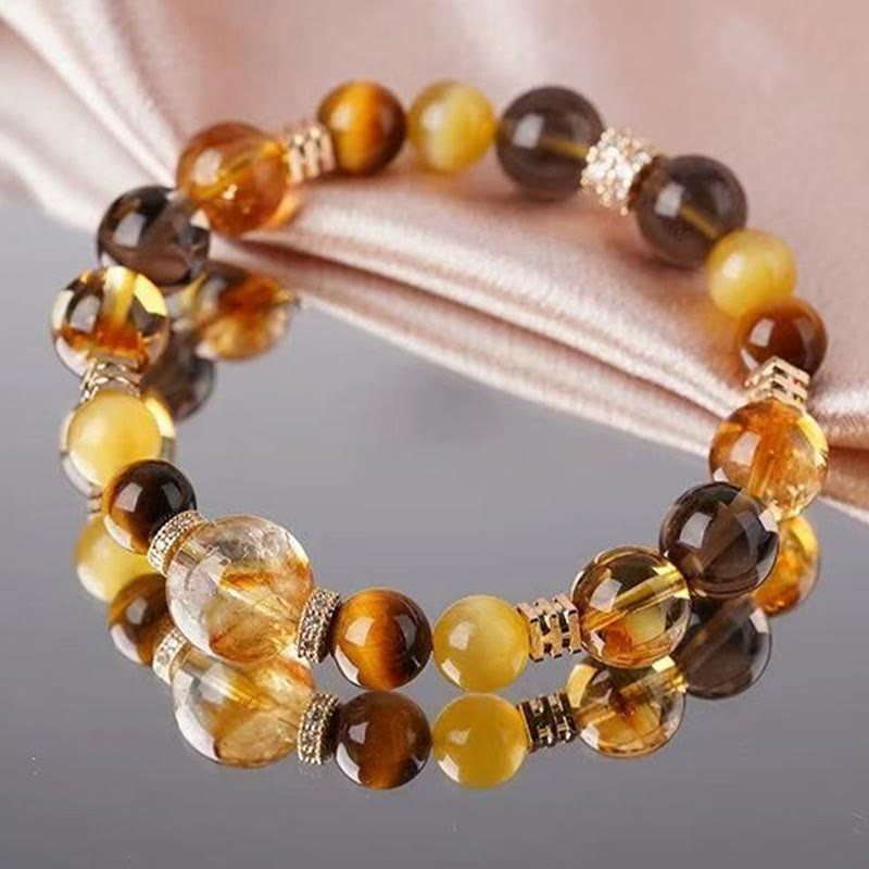 Pulsera de la felicidad con citrino, topacio y ojo de tigre de Buddha Stones