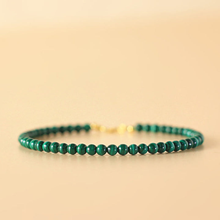 Pulsera antiansiedad de cobre bañada en oro de 14 k con cuentas de malaquita natural de 4 mm y Buddha Stones