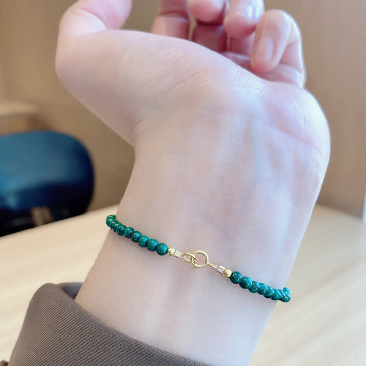 Pulsera antiansiedad de cobre bañada en oro de 14 k con cuentas de malaquita natural de 4 mm y Buddha Stones