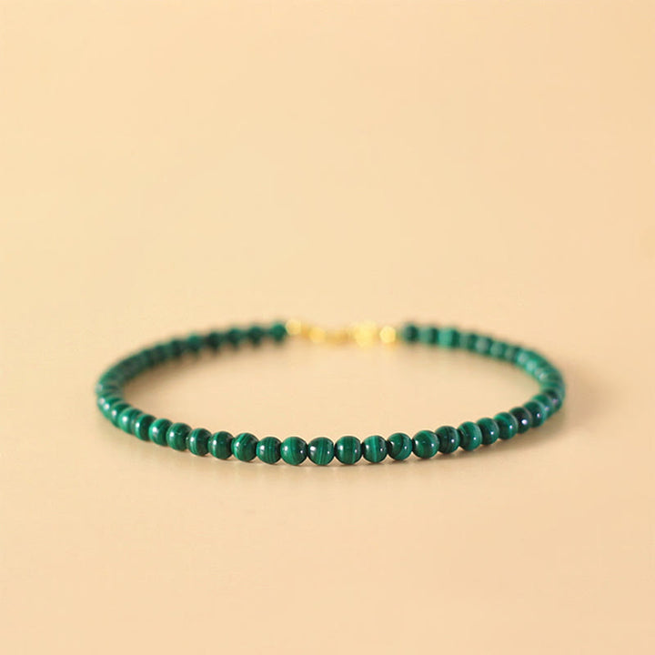 Pulsera antiansiedad de cobre bañada en oro de 14 k con cuentas de malaquita natural de 4 mm y Buddha Stones