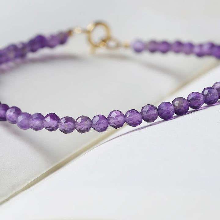 Pulsera de conciencia espiritual de cobre bañado en oro de 14 k con cuentas ultrafinas de amatista natural de 3 mm y Buddha Stones