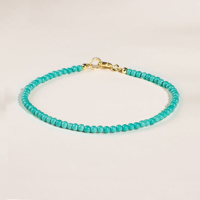 Pulsera de la sabiduría de cobre bañada en oro de 14 k con cuentas ultrafinas de turquesa de 2 mm y Buddha Stones