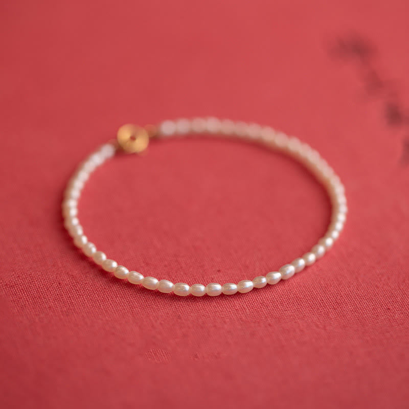 Pulsera de la sabiduría de cobre bañada en oro de 14 k con perlas naturales ultrafinas de 2 mm y Buddha Stones