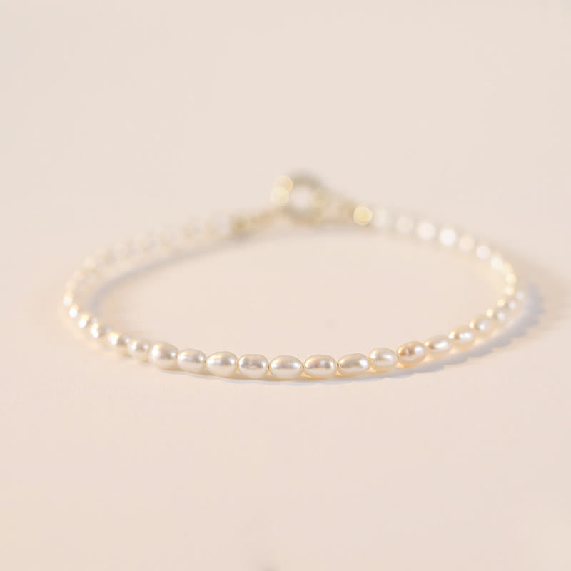 Pulsera de la sabiduría de cobre bañada en oro de 14 k con perlas naturales ultrafinas de 2 mm y Buddha Stones