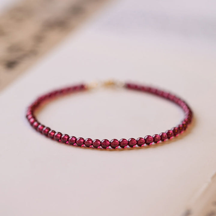 Pulsera protectora de cuentas ultrafinas de granate natural de 3 mm con Buddha Stones