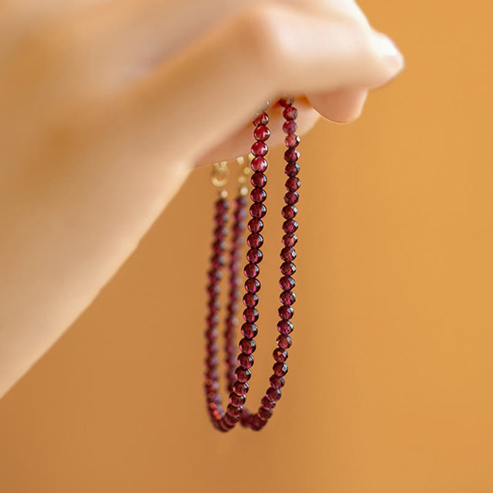 Pulsera protectora de cuentas ultrafinas de granate natural de 3 mm con Buddha Stones