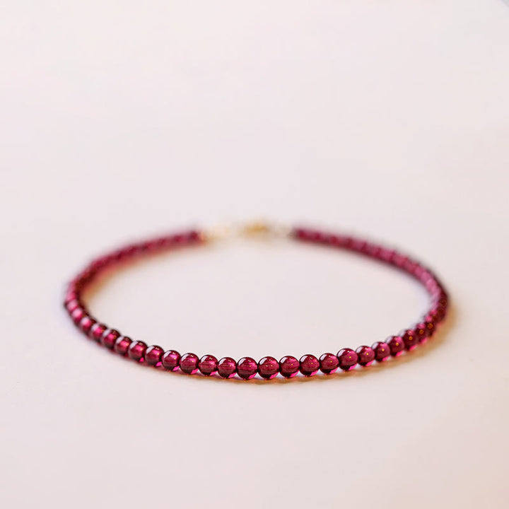 Pulsera protectora de cuentas ultrafinas de granate natural de 3 mm con Buddha Stones