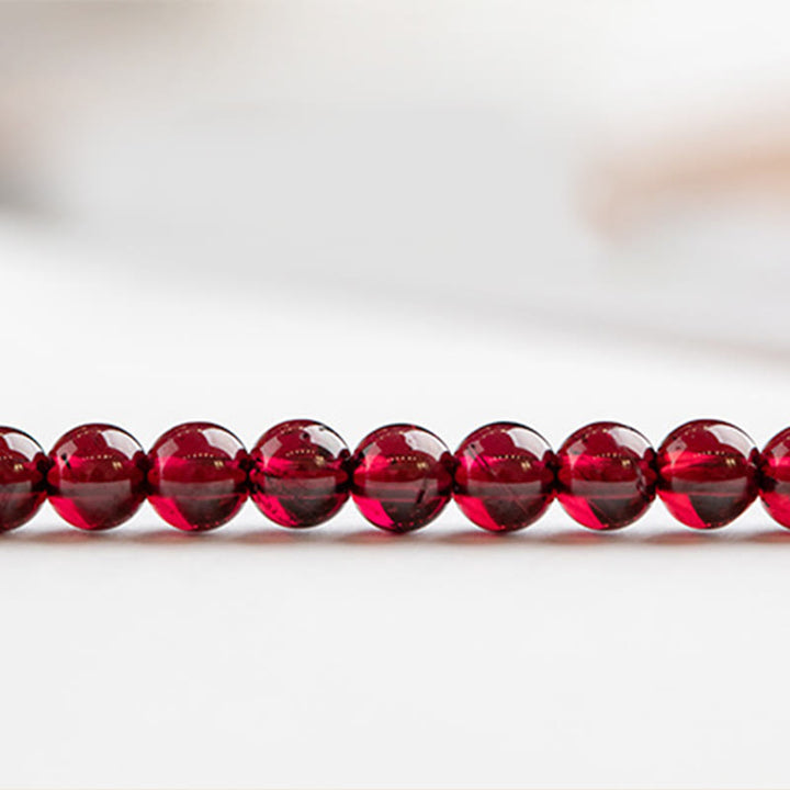 Pulsera protectora de cuentas ultrafinas de granate natural de 3 mm con Buddha Stones