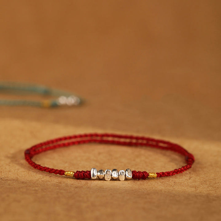 Pulsera trenzada ultrafina con hilo de plata de ley 925 y Buddha Stones para proteger la suerte