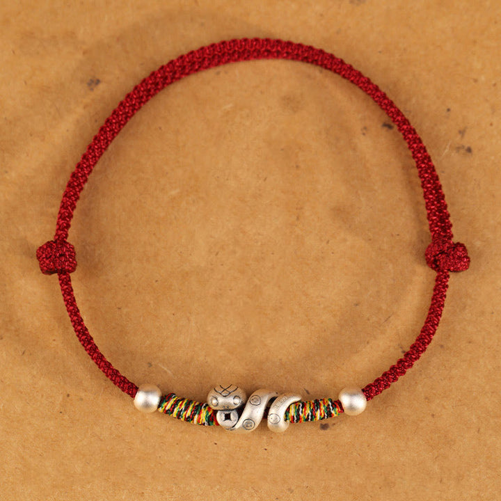 Tobillera con hilo rojo y Buddha Stones en plata de ley 999 con el año de la serpiente