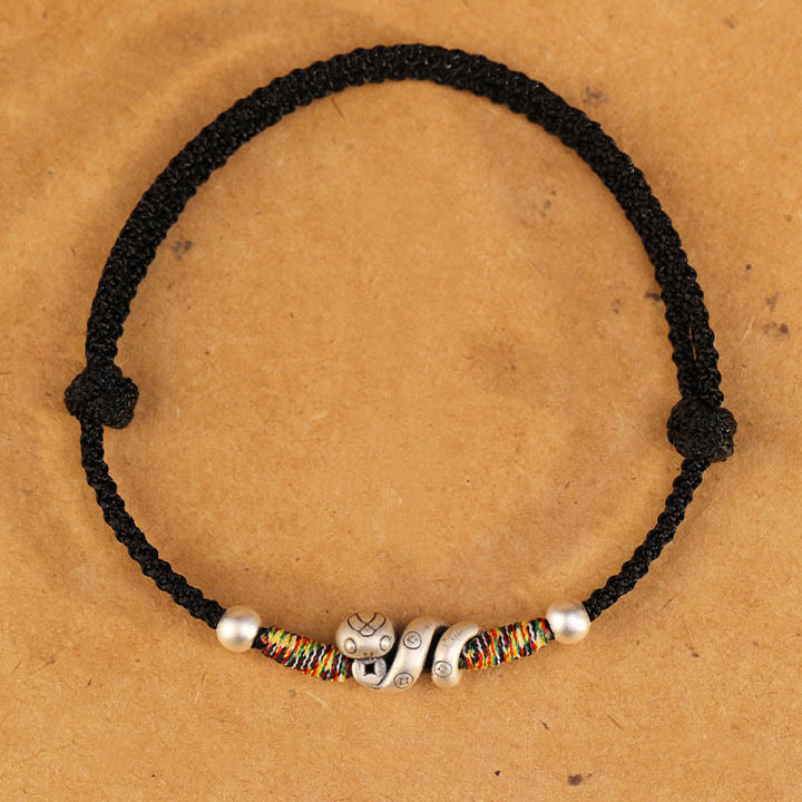 Tobillera con hilo rojo y Buddha Stones en plata de ley 999 con el año de la serpiente