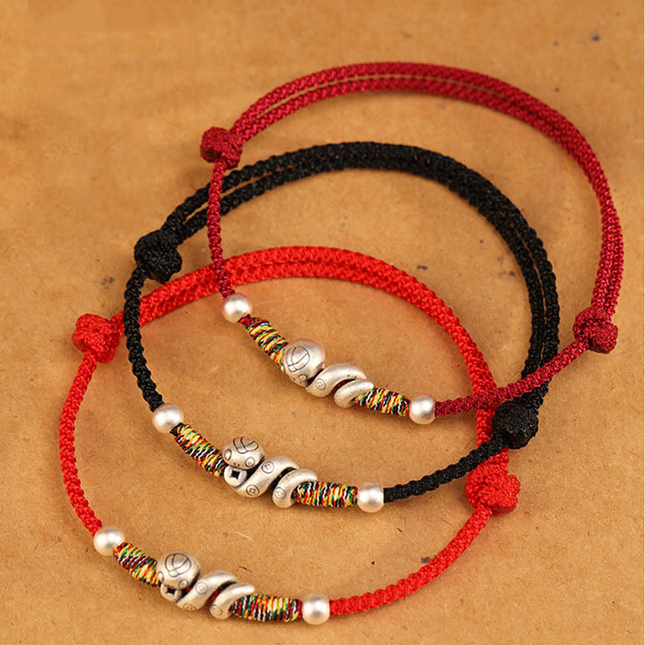 Tobillera con hilo rojo y Buddha Stones en plata de ley 999 con el año de la serpiente
