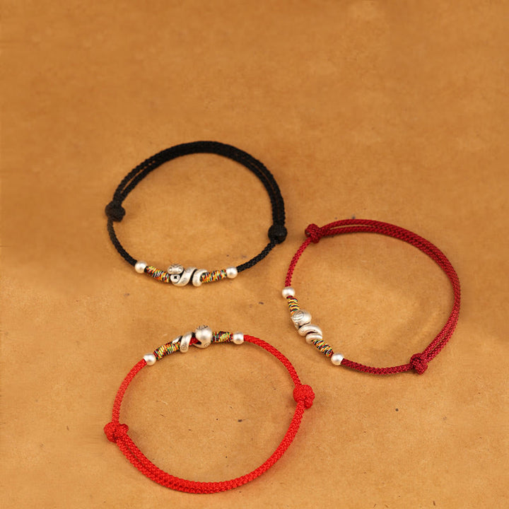 Tobillera con hilo rojo y Buddha Stones en plata de ley 999 con el año de la serpiente