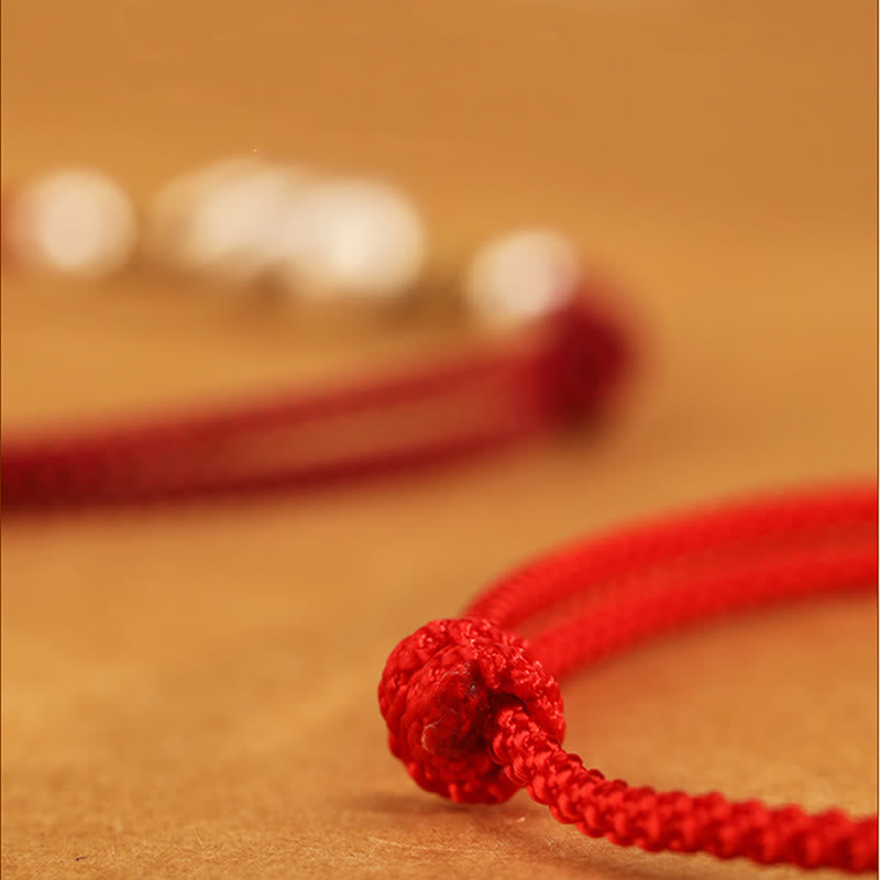Tobillera con hilo rojo y Buddha Stones en plata de ley 999 con el año de la serpiente