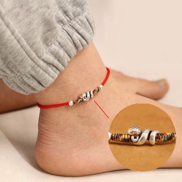 Tobillera con hilo rojo y Buddha Stones en plata de ley 999 con el año de la serpiente
