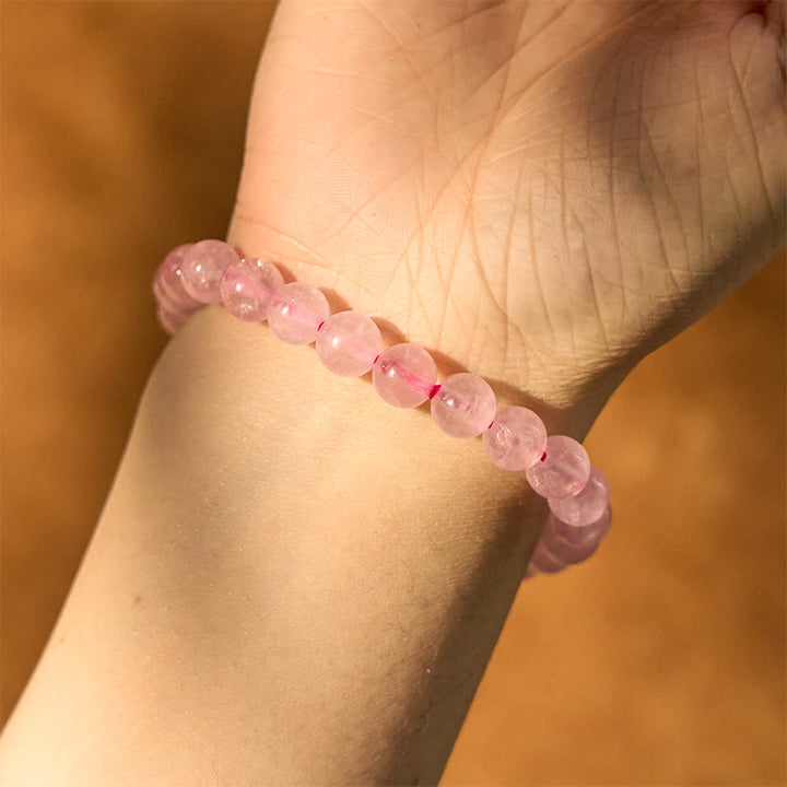 Pulsera de energía curativa de cuarzo rosa con Buddha Stones