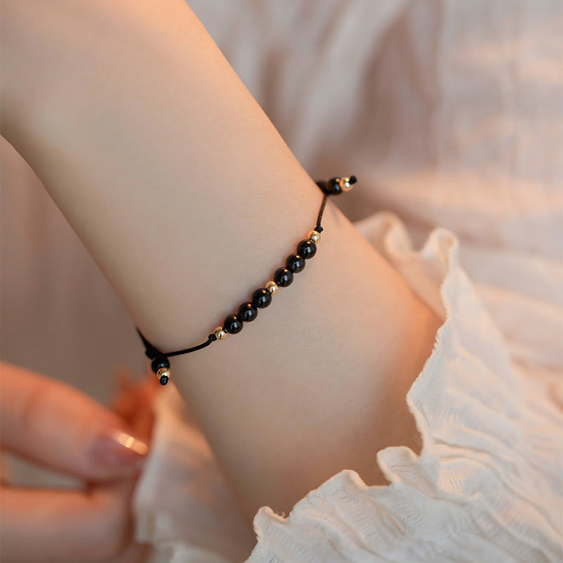 Pulsera de éxito con cuentas ultrafinas de obsidiana negra y cuarzo ahumado de Buddha Stones