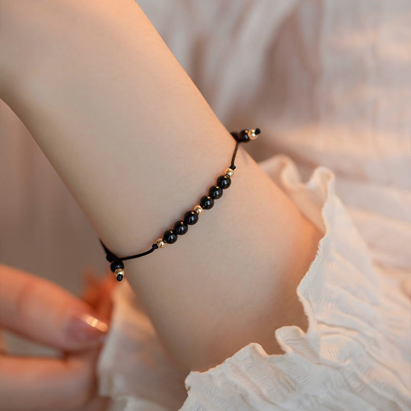 Pulsera de éxito con cuentas ultrafinas de obsidiana negra y cuarzo ahumado de Buddha Stones