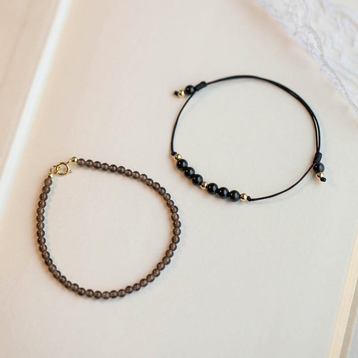 Pulsera de éxito con cuentas ultrafinas de obsidiana negra y cuarzo ahumado de Buddha Stones