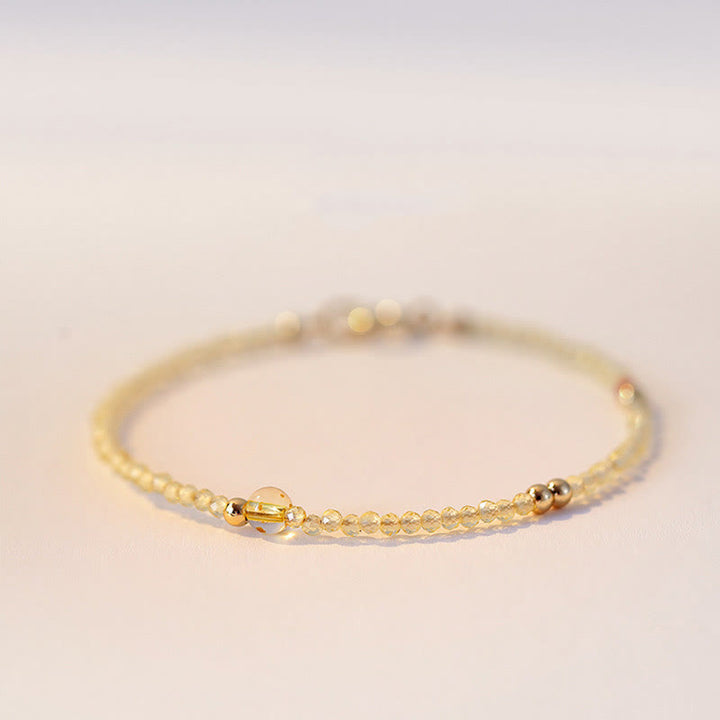 Pulsera protectora con cuentas de cobre bañadas en oro de 14 quilates y citrino ultrafinas de 2 mm de Buddha Stones