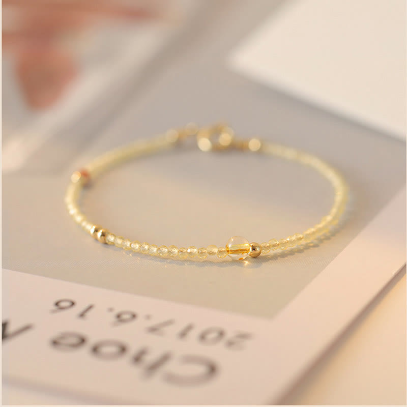 Pulsera protectora con cuentas de cobre bañadas en oro de 14 quilates y citrino ultrafinas de 2 mm de Buddha Stones