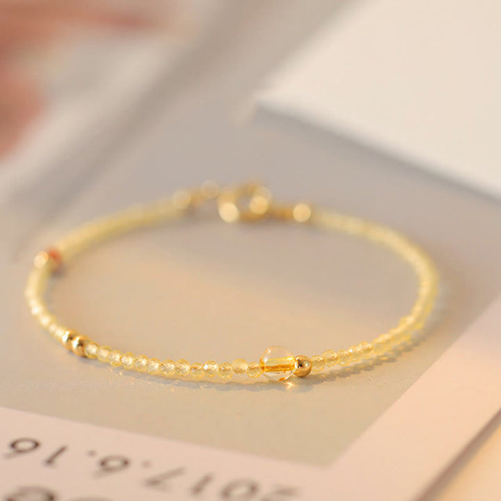 Pulsera protectora con cuentas de cobre bañadas en oro de 14 quilates y citrino ultrafinas de 2 mm de Buddha Stones