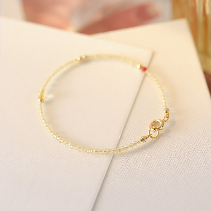 Pulsera protectora con cuentas de cobre bañadas en oro de 14 quilates y citrino ultrafinas de 2 mm de Buddha Stones