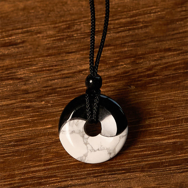 Collar con colgante de fuerza con cuerda trenzada y diseño de hebilla de paz Yin Yang con obsidiana negra natural y turquesa blanca y Buddha Stones