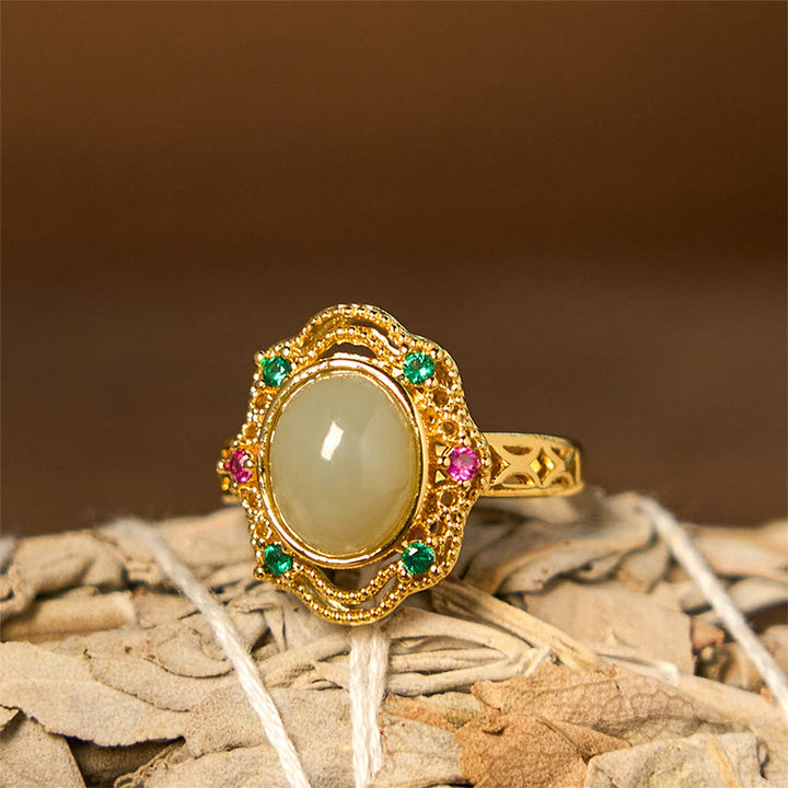 Anillo de la suerte abierto de cobre con diseño hueco de huevo de jade hetiano natural y Buddha Stones