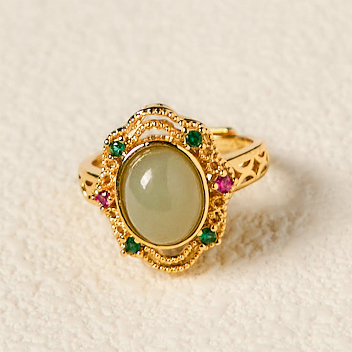 Anillo de la suerte abierto de cobre con diseño hueco de huevo de jade hetiano natural y Buddha Stones